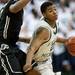 EMU freshman Jalen Ross gets around a Purdue defender in the second half of the game on Saturday. Daniel Brenner I AnnArbor.com